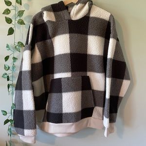 Comfy, soft hoodie with a checkered pattern.
